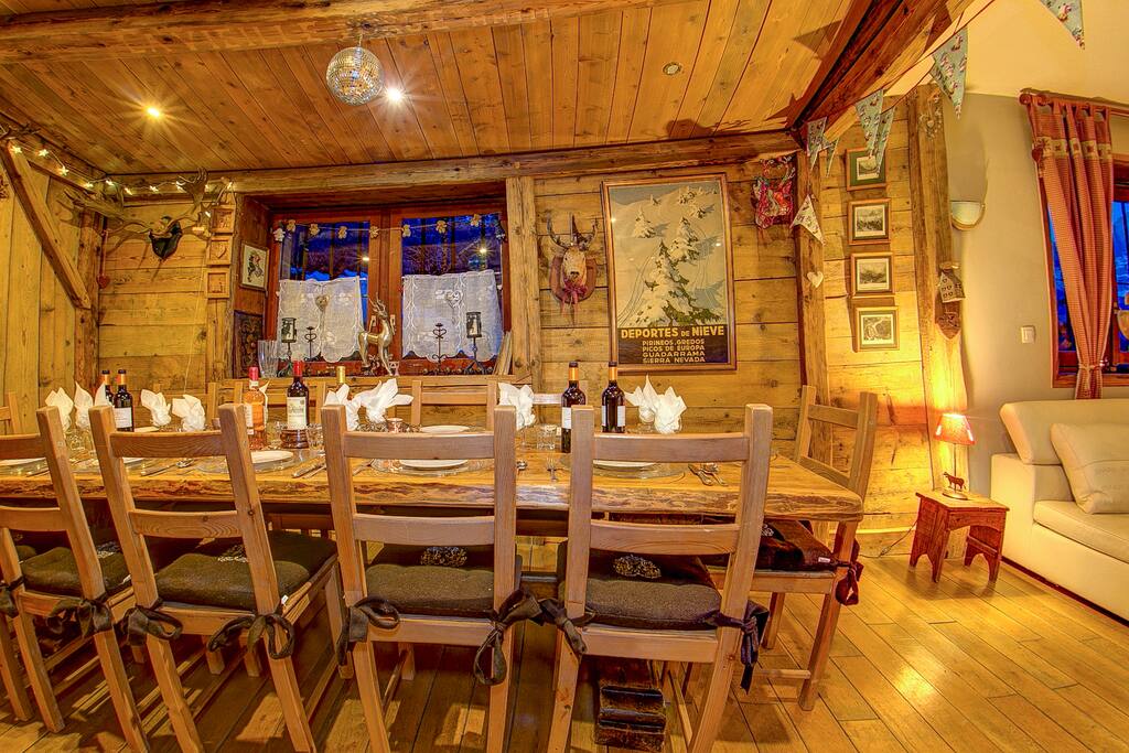 cosy dining area with antlers and fairy lights!