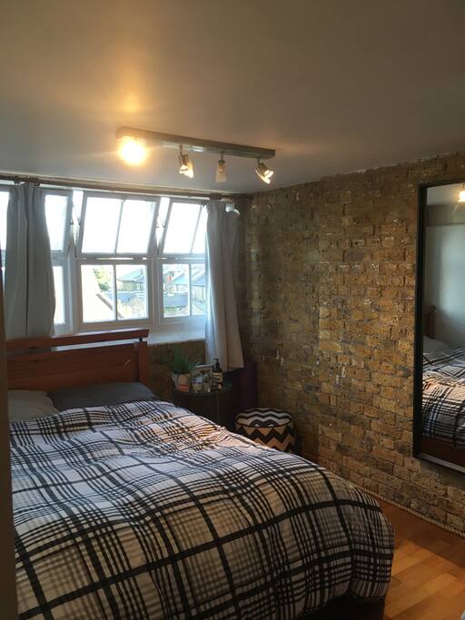 Bedroom with queen sized bed. View of the shard and cityscape from bedroom!