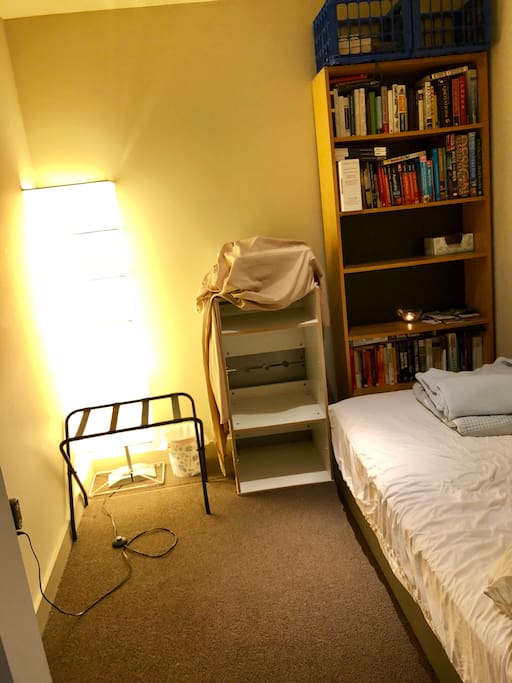 The main guest will sleep in the den with a double-layered curtain for privacy.
