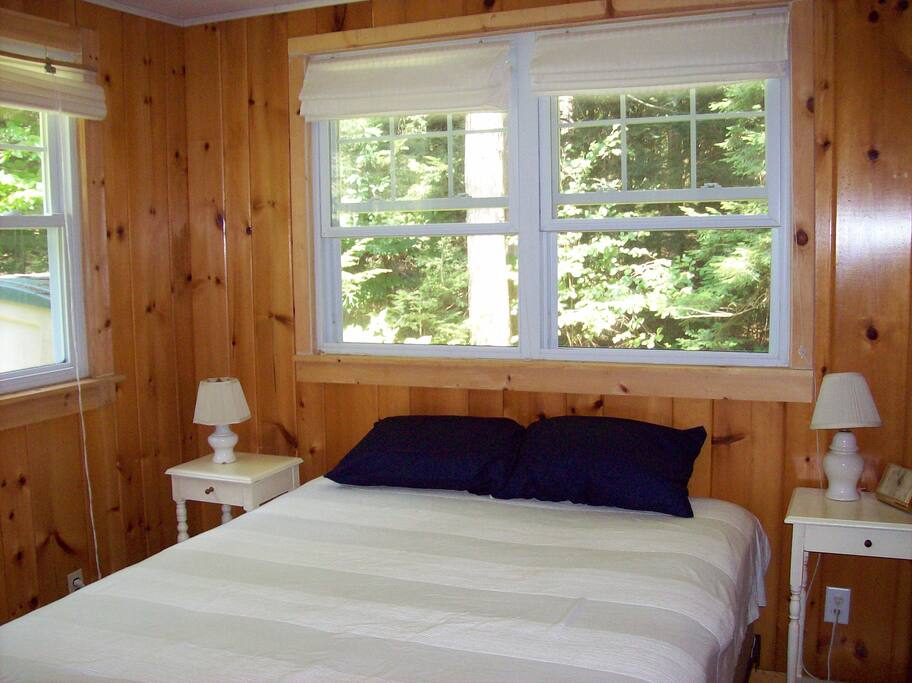 One of two bedrooms -- queen bed with two dressers.