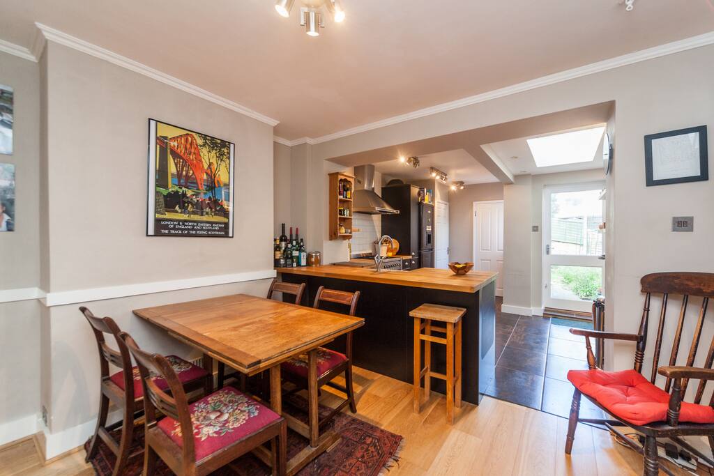 Light and airy kitchen with garden and bathroom beyond
