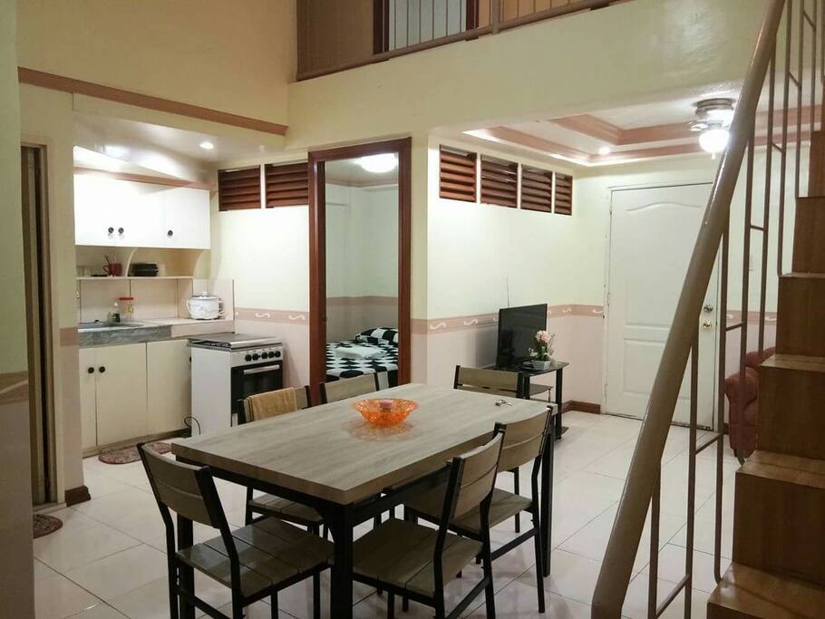 living and dining area and bedroom downstairs