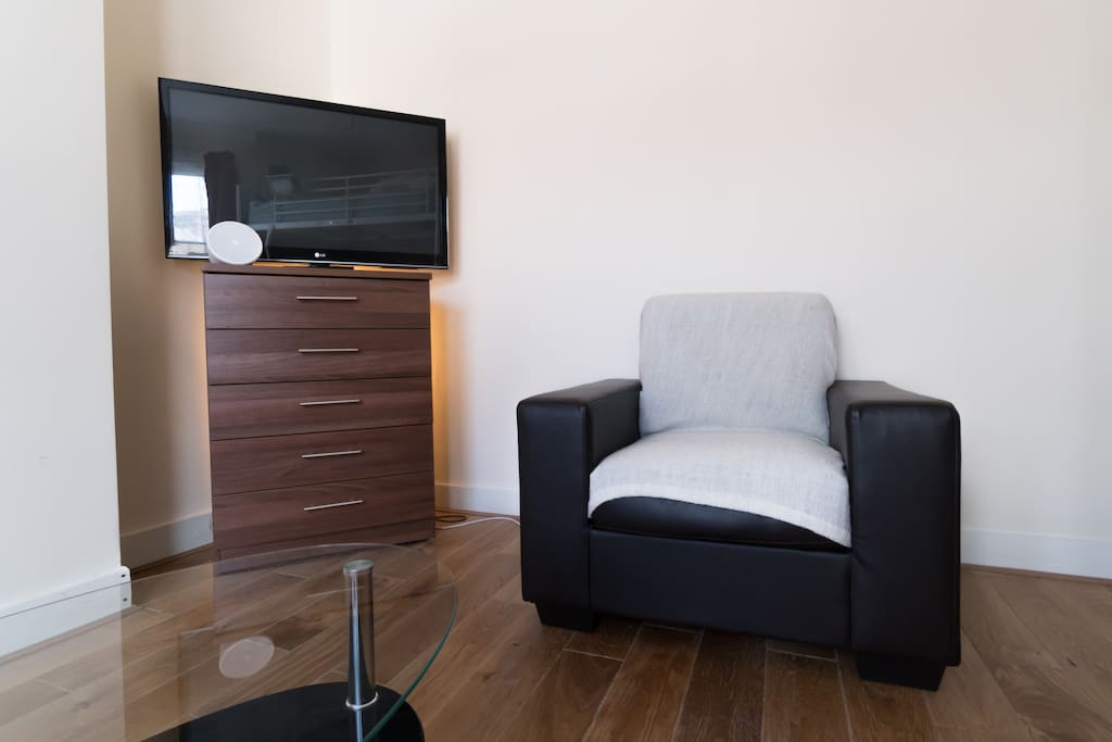 42'' LCD Tv and cozy sofa