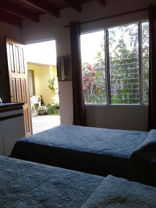 Habitación a nivel del jardín