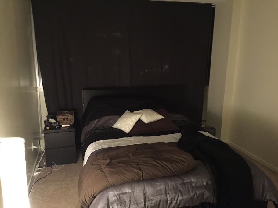 Bedroom with a walk-in closet