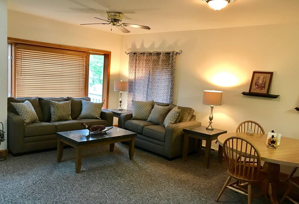 Comfortable living room with wood burning fireplace
