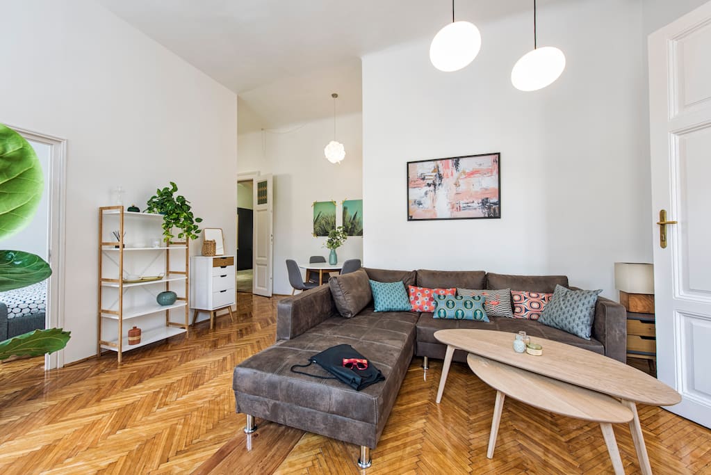 Spacious living room with beautiful Scandinavian design furniture, the convertible sofa perfectly accommodates the 5th guest