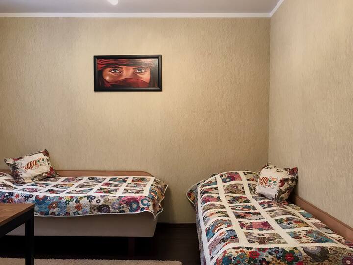 two children's beds in a separate room