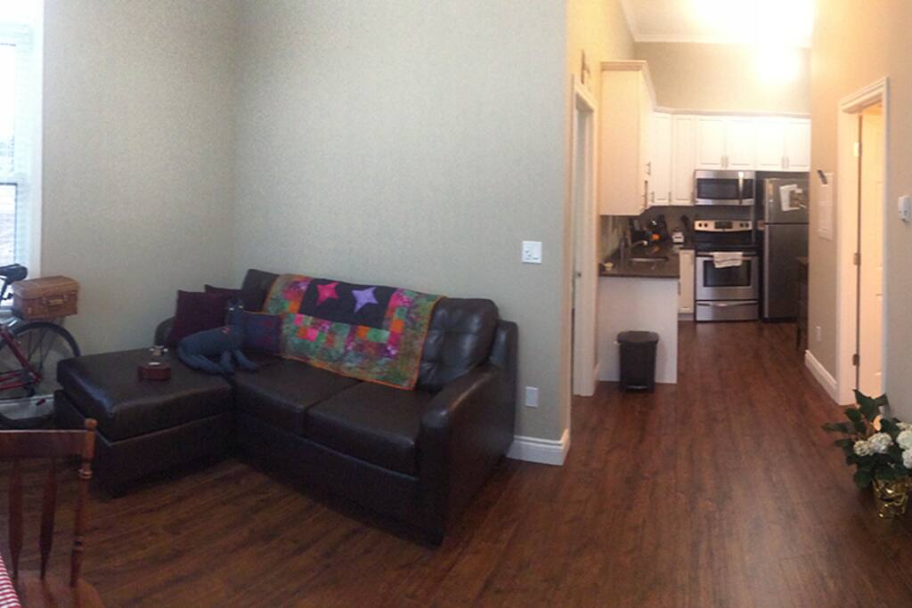 Living room, dining room and view towards the kitchen.