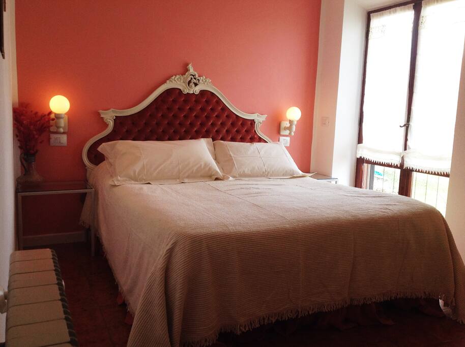 Main Room with balcony and bathroom upstairs