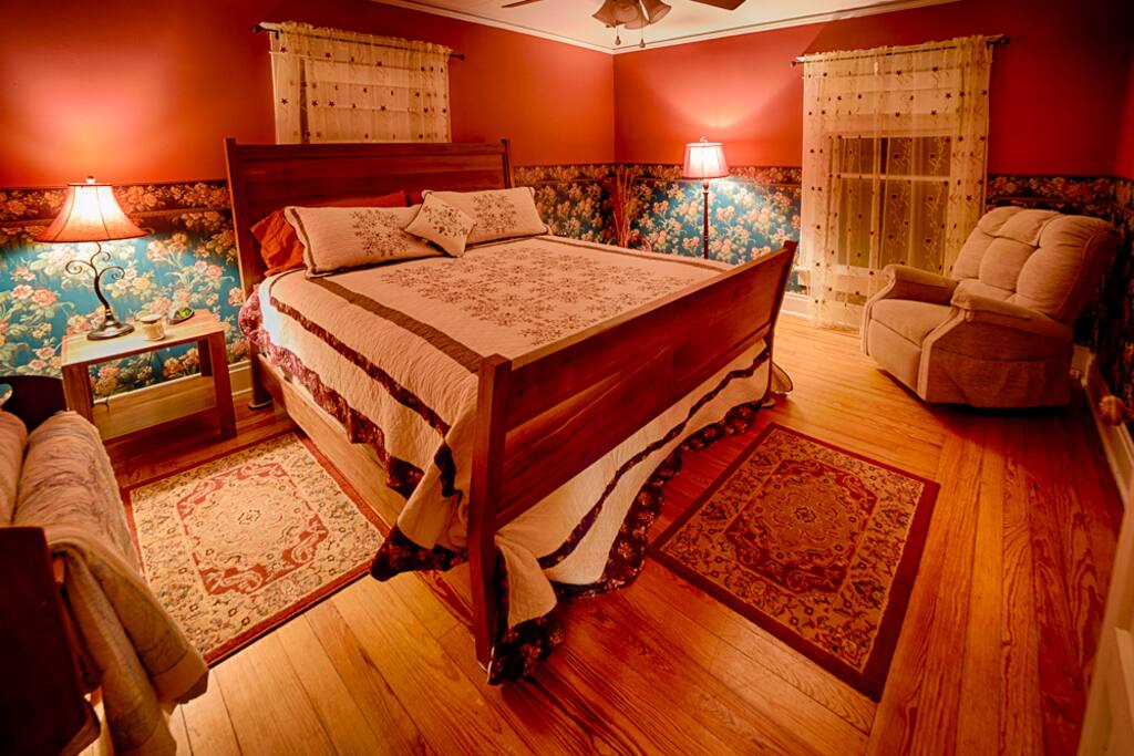 Our handmade King walnut bed in one of our large rooms. A full 225 square feet of space.