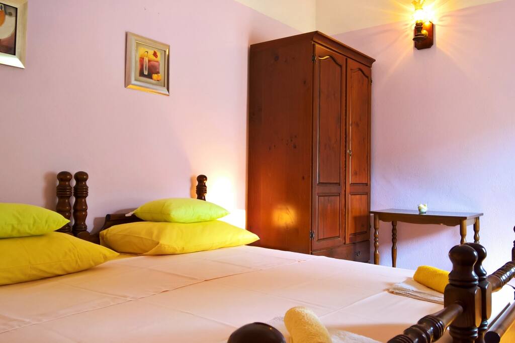 Master bedroom on the second floor with king size bed, different view