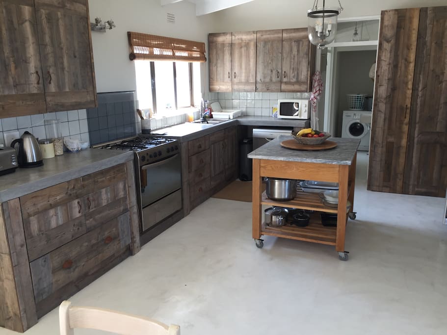 Kitchen with natural sun bleached spruce cupboards