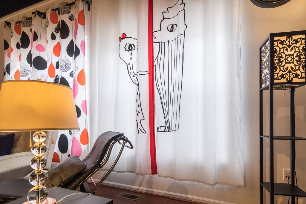 Cool curtains add some funkiness to the space.