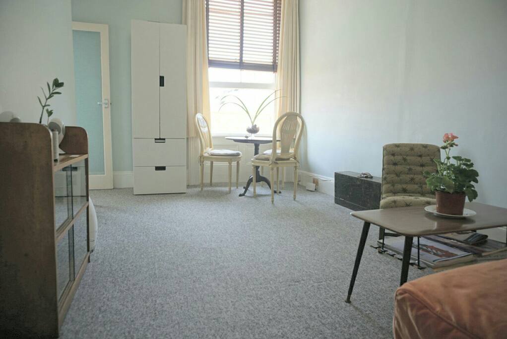 spacious main room with dinning area, separate furnished kitchen and separate fitted bathroom
