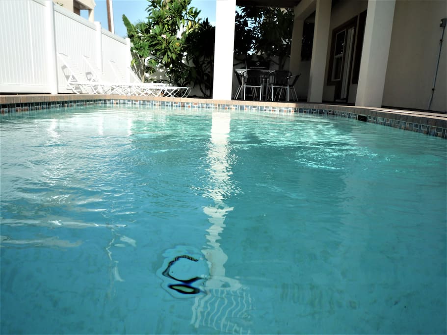 Sparkling emerald pool, the warm sun and ocean breeze sure will soak all of your stress away