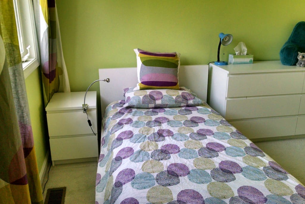 Twin bed with closet storage, night stand, drawers