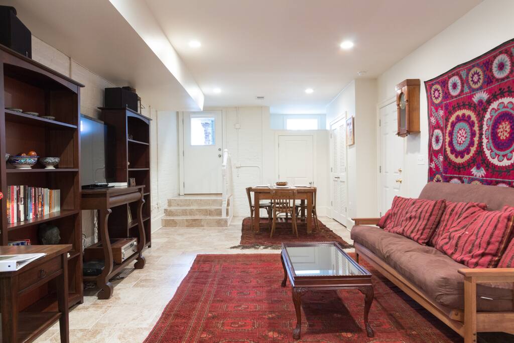It also features front and back doors with large windows as well as numerous smaller windows to let in natural light.