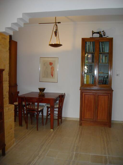 Old Greek traditional hand made renovated engraved furniture and paintings produced by me. There you can use it for lunch or for your laptop. There is an internet connection.