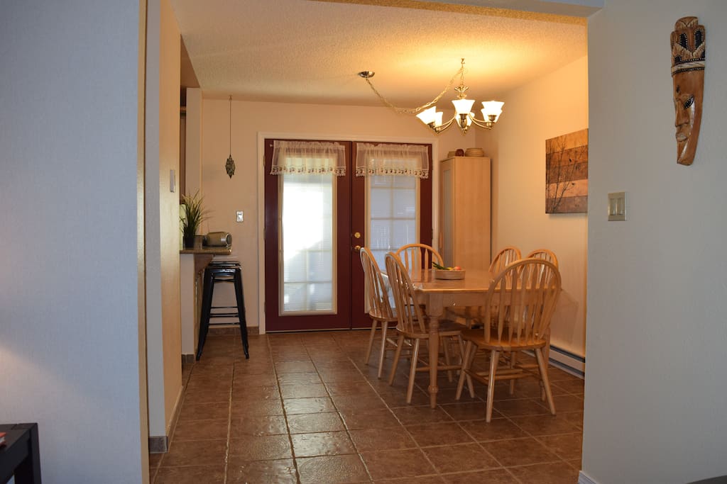 Dining - French doors open up to patio and garden space
