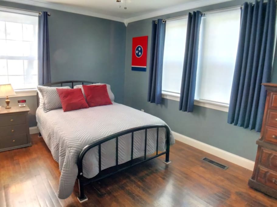 Bedroom 2 - includes nightstand with reading lamp. The clock has a USB charging port.