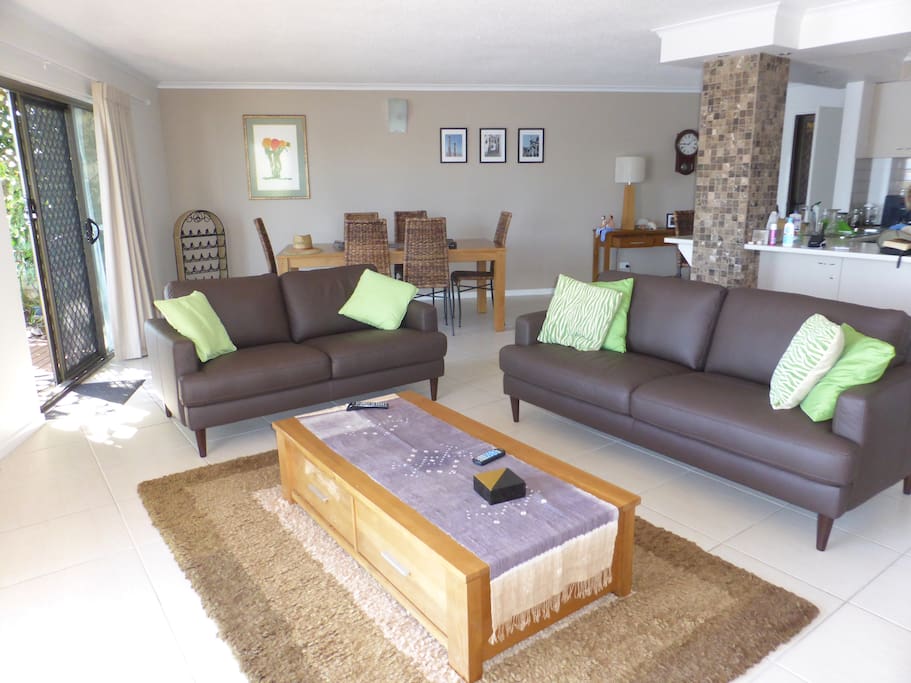The lounge and dining areas overlooking the water