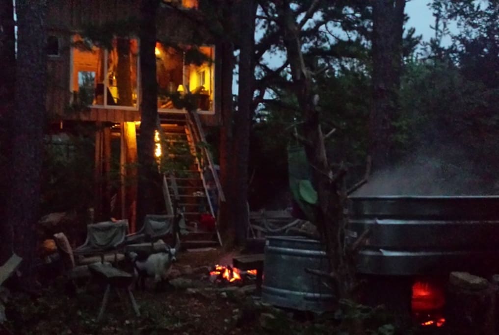 Steam rolls off the enchanting outdoor tin hot tub as the fire below transforms it to the perfect temperature for a moonlit soak.