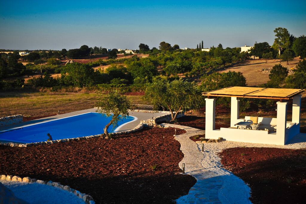 The pool and pool-side gazebo viewed looking down from the villa over the valley (2014) before the olive grove was planted