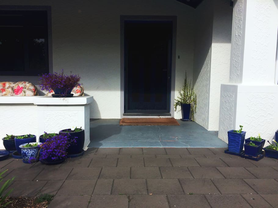 Front entrance of the property with seating