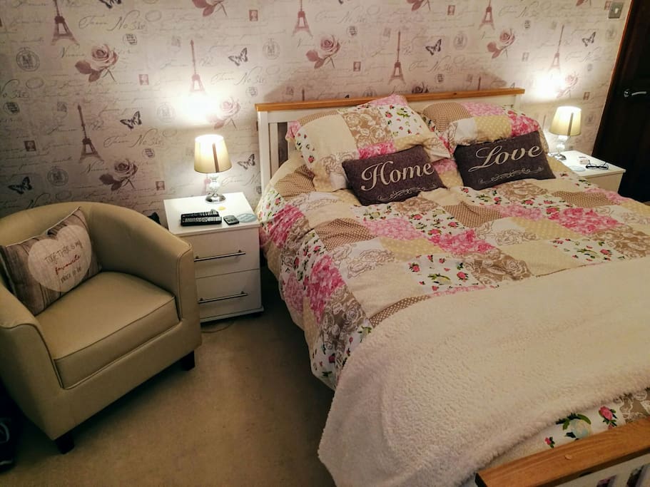 King-size bed in the Paris room