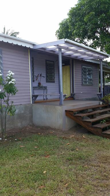 Island Living House. A modern island cottage design. The front porch is a perfect place to catch the sunset.