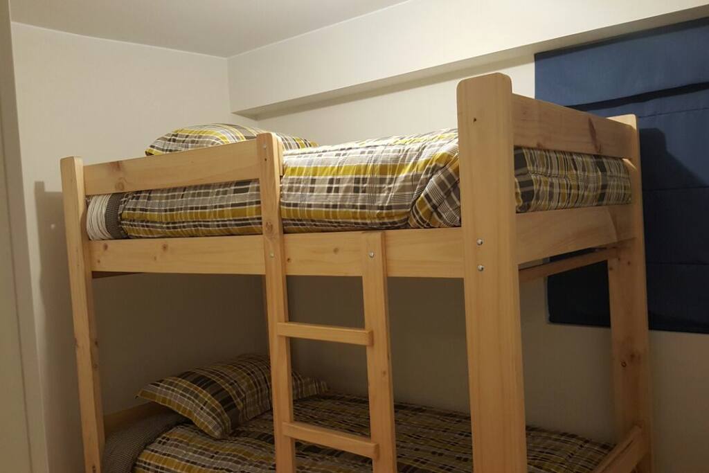 Private Room w/ 2 beds& shared bathroom/shower where 2 - 4 people can share two large beds if desired.
