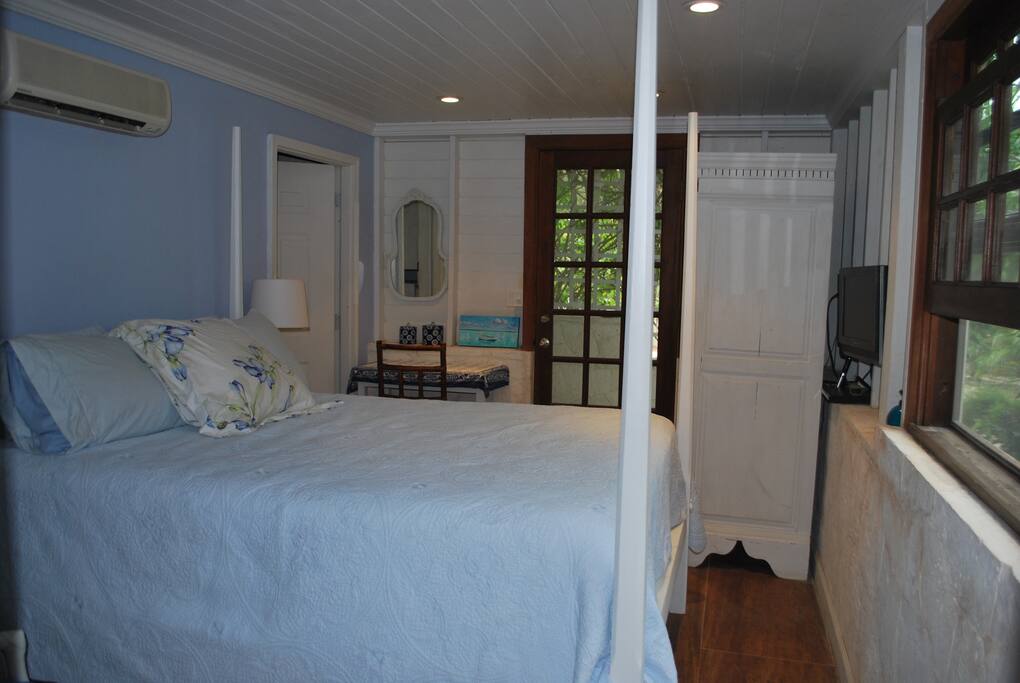Bedroom has view of the garden