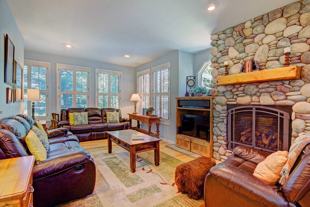 Stay warm and cozy by the elegant gas fireplace