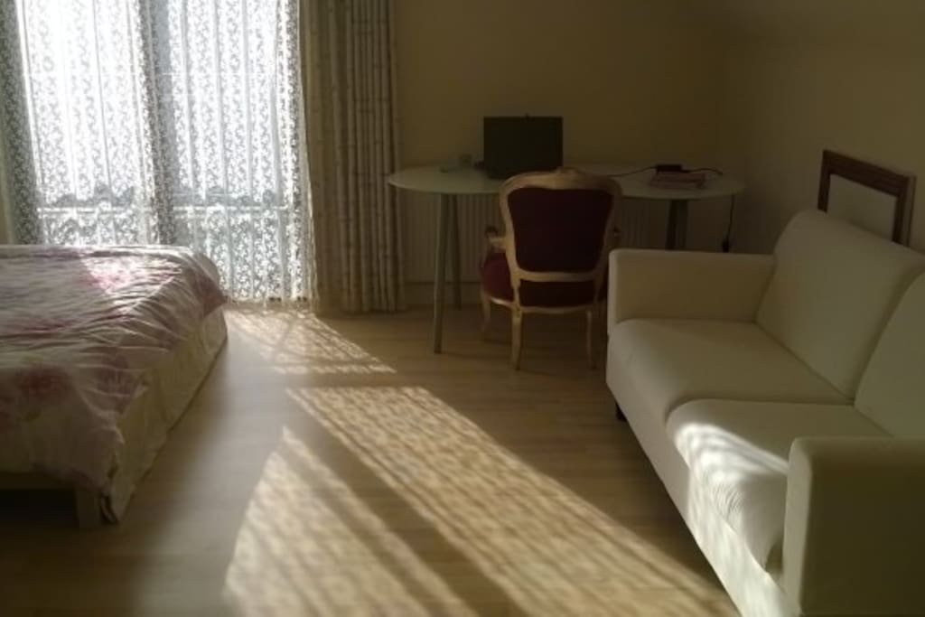 large double bedroom with balcony & ensuit