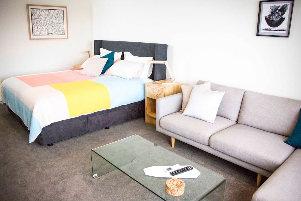 Contemporary artwork finishes the space.