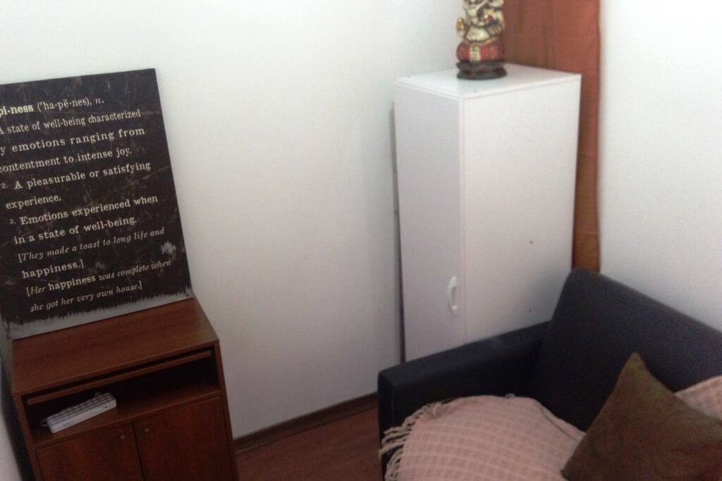 Sala com sofá cama