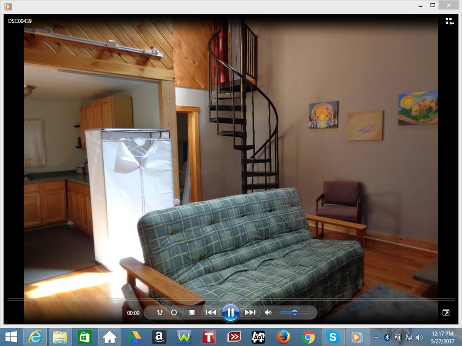 Living room to kitchen, stairways to bedroom