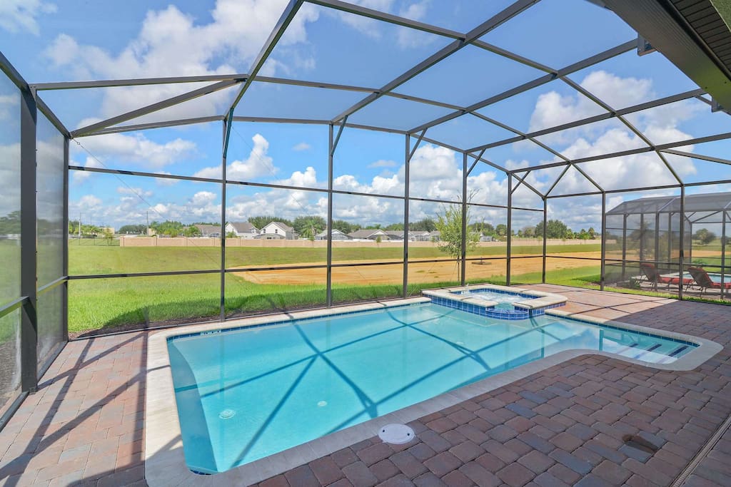 Enjoy the Florida sunshine in your private, enclosed pool area! Relax on the deck loungers reading a book or sun bathing in this private paradise.