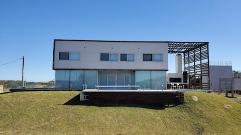 A beachfront house with an ocean view