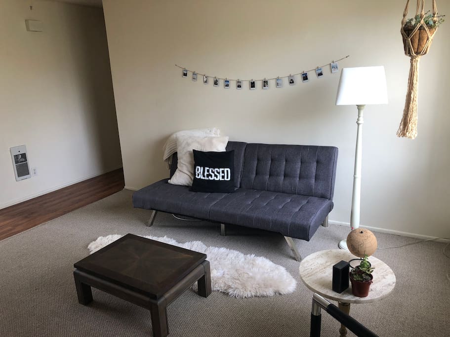 Grey Couch unfolds into single bed!
