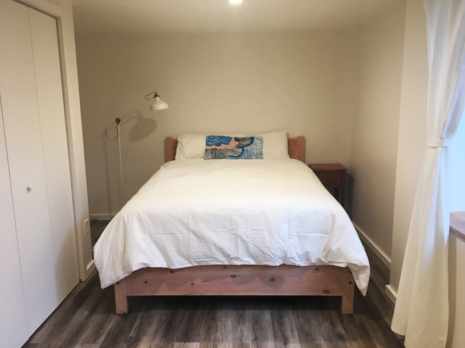Queen sized, comfy Parklane mattress on locally made solid wood bed frame from Mission Craft furniture