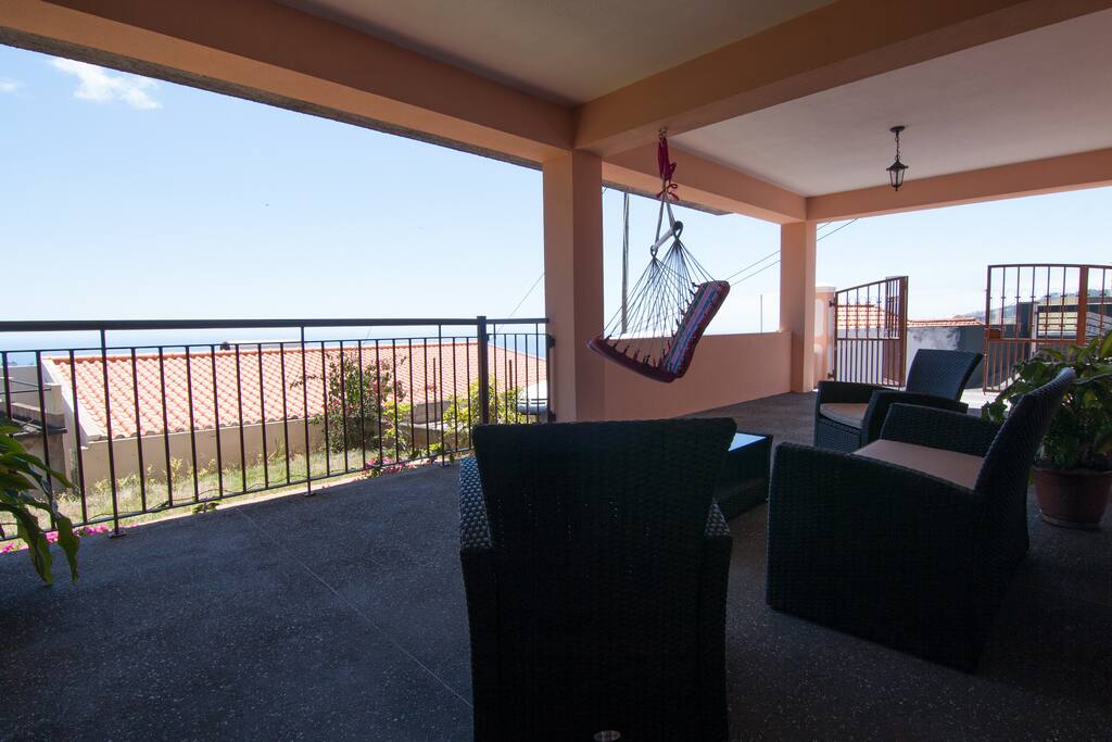 Terrace with garden chairs and table
