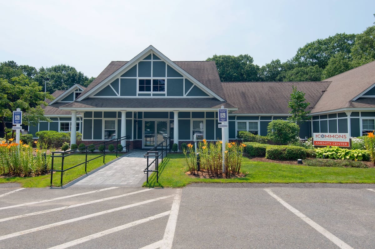 Exterior of Commons at Windsor Gardens, an Airbnb-friendly apartment in Norwood, MA