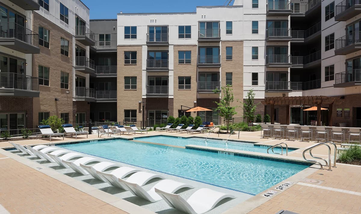 Exterior of The Flats at Palisades, an Airbnb-friendly apartment in Richardson, TX