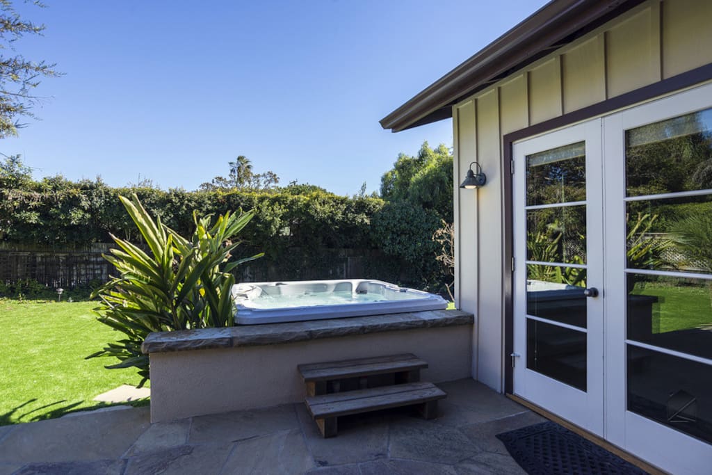 Enjoy a soak under the stars in your private outdoor hot tub.