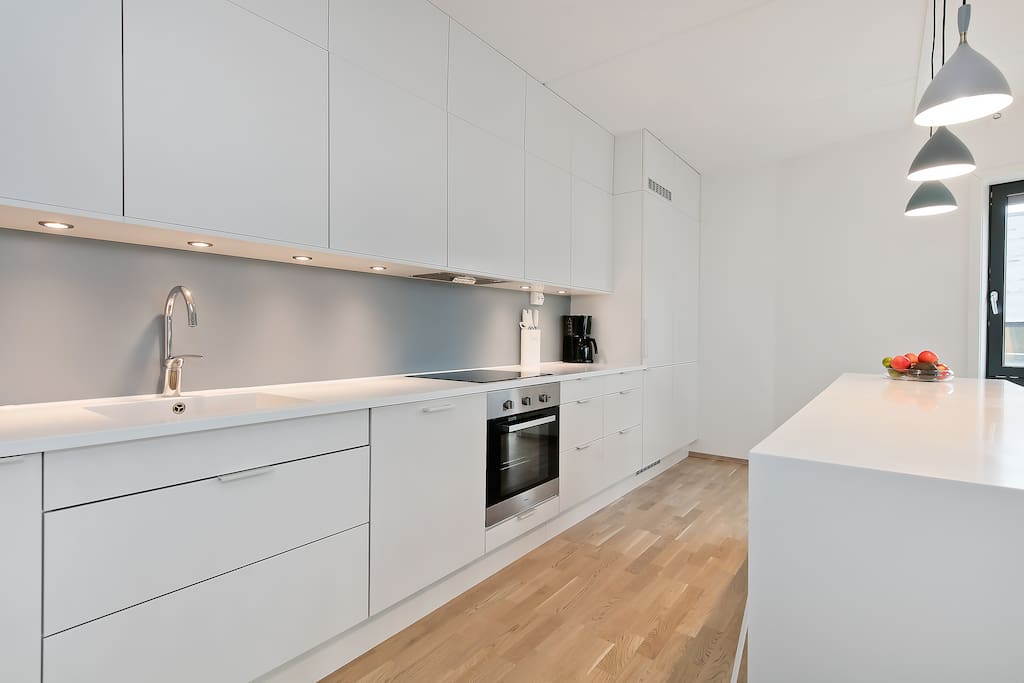 Bright and modern kitchen with ample space for cooking