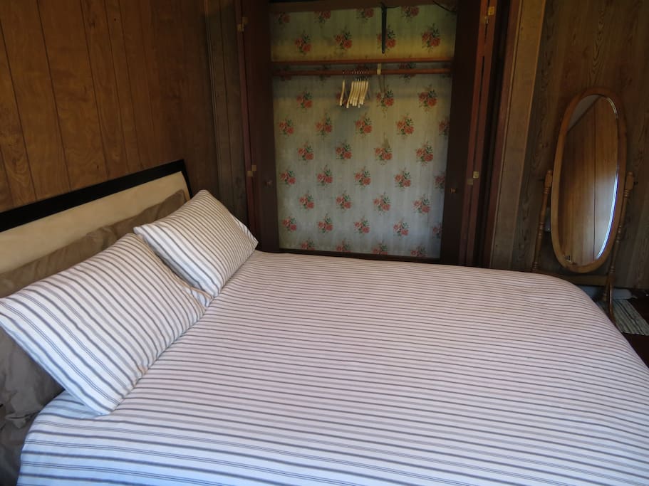 Closet with hangers, extra sheets, portable fan and heater.