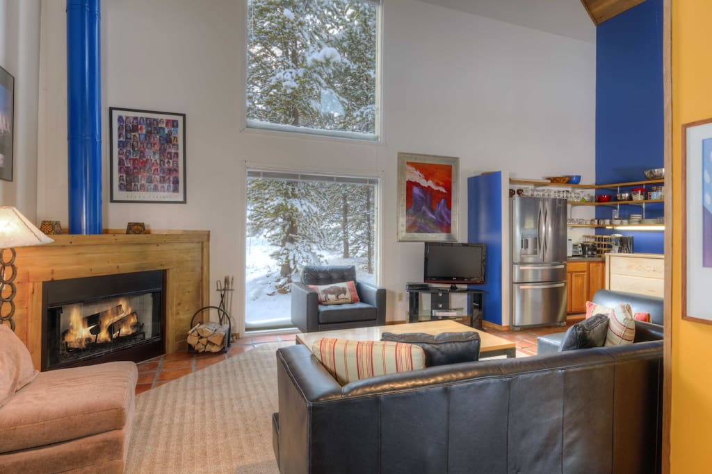 Main living area; wood fireplace; flat screen TV; Leather couches