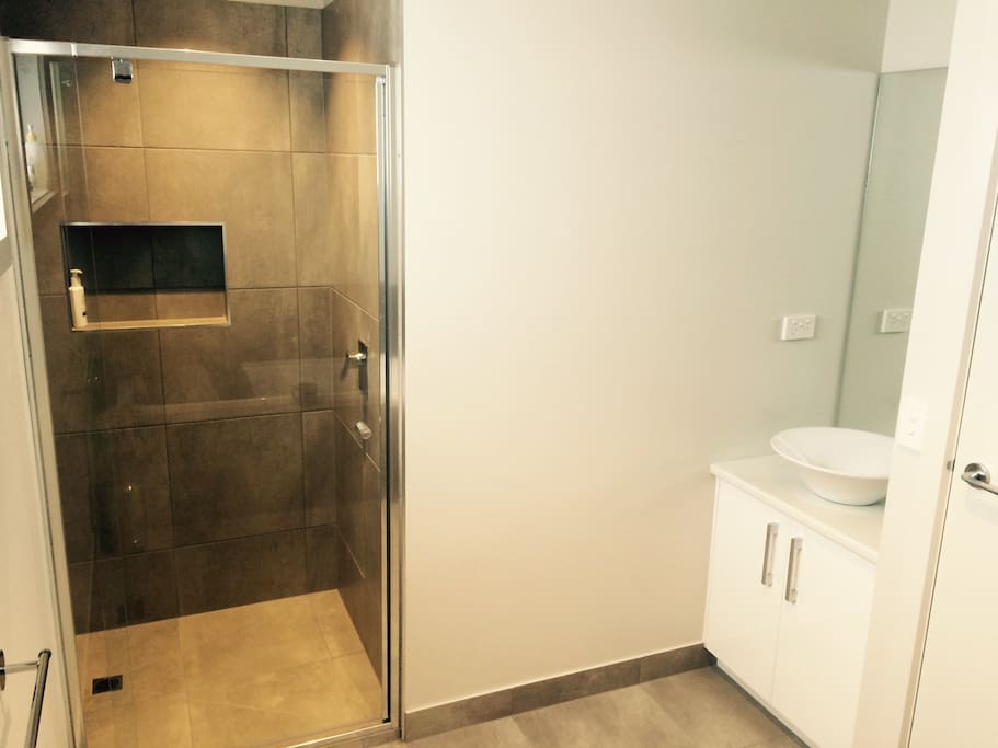 Bathroom with shower and bath